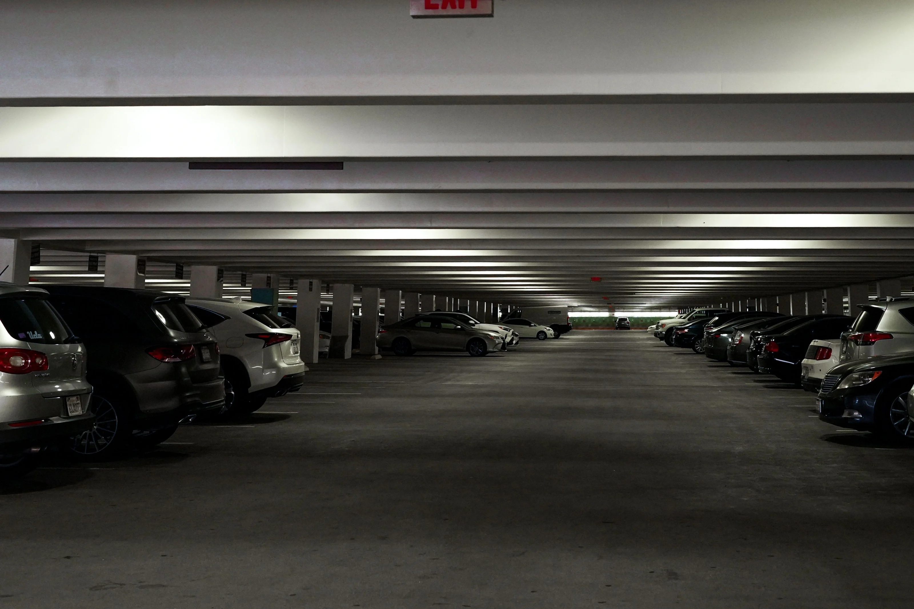 Cars inside a multi-storey parking area — illustrative sector photograph