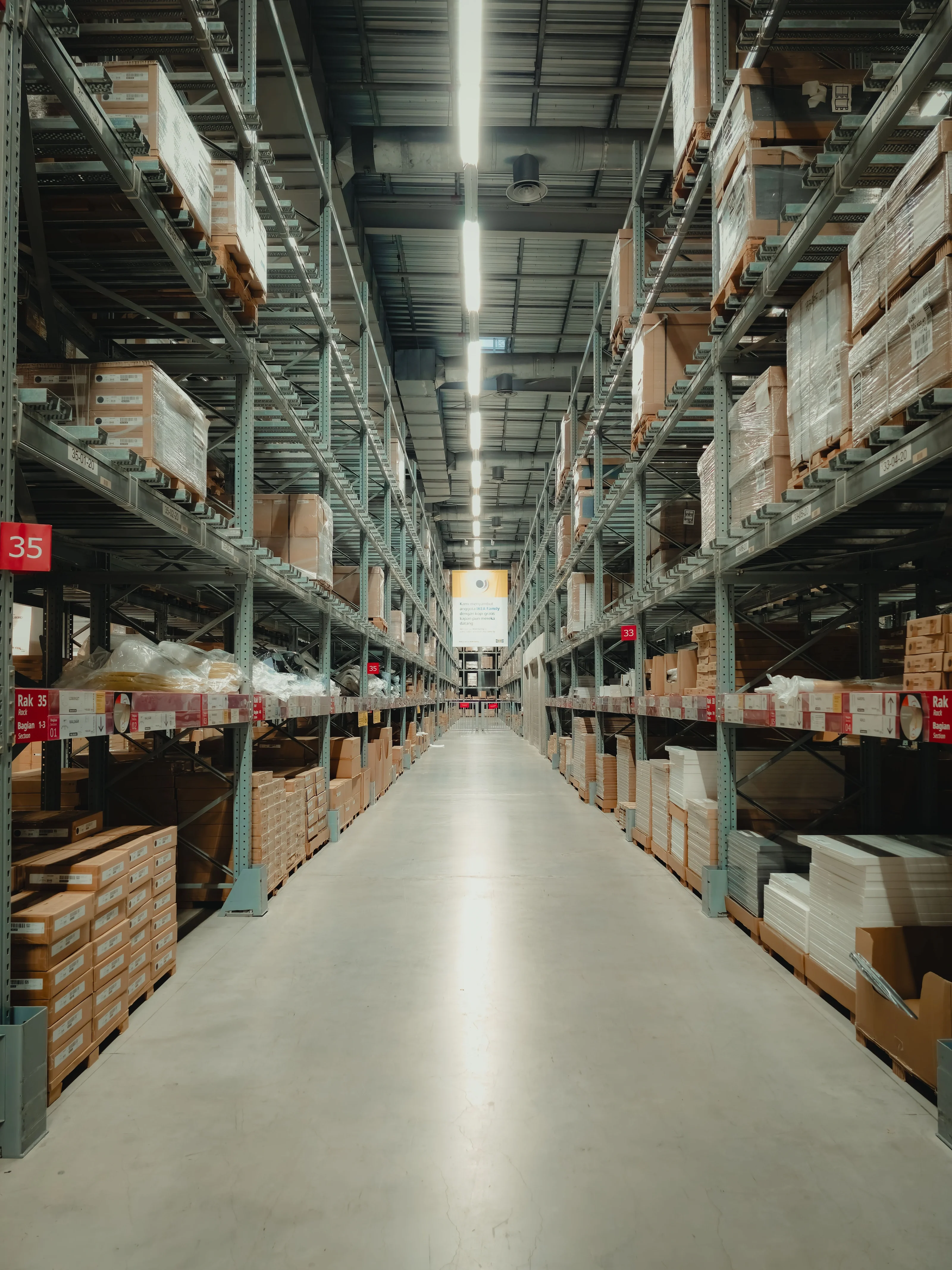 Aisle inside a large storage facility — illustrative sector photograph